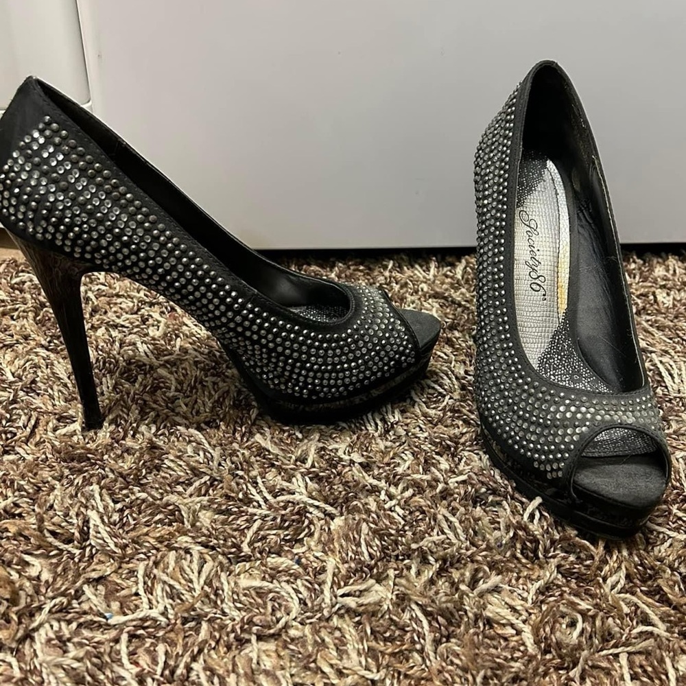 Black and rhinestone heels